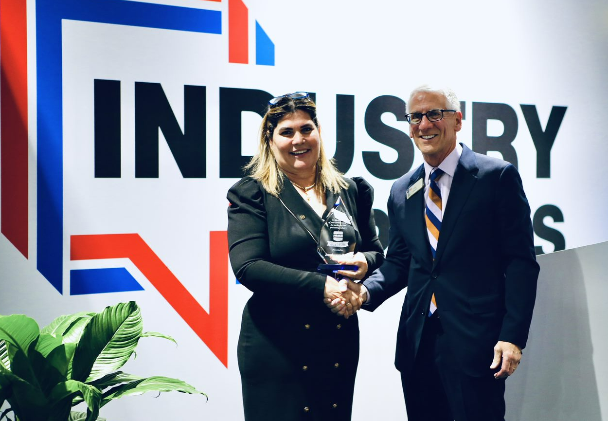 Rose Graffin, Chairman of the Board & CEO of KIWL Machine Holding accepts the 2022 Packaging & Processing Hall of Fame Award in honor of its founder JJ Graffin
